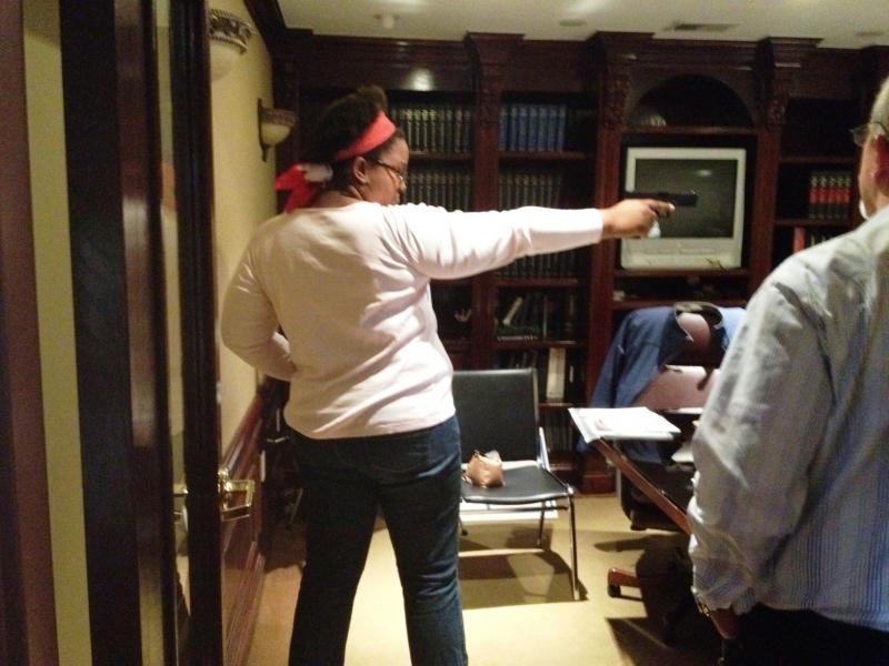 Student aiming at target